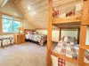 Bedroom #1 located upstairs with a Queen and bunk bed.