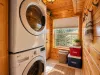 Laundry room with front load washer and dryer. Laundry soap provided.