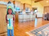 Indian carving with overview of the kitchen