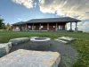 Fire pit located outside to use during your stay.