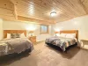 Bedroom #7 located downstairs with 2 Queen beds.