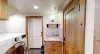 The laundry area is shared with the Yellowstone Days unit.