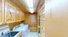 Laundry room with full size washer and dryer. Laundry soap is provided.