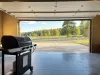 Large garage with BBQ for you to roll out to use.