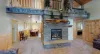 Main level living room with a fireplace, make sure to bring your own wood.