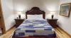 Second bedrooms queen sized bed.