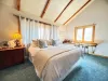 Sink into the Master bedroom king bed, with a futon, twin and full size beds.