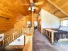 View from the loft to the bedrooms and stairs.