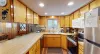 A large kitchen fully equipped for all your needs during your stay.