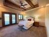 Master bedroom with a Queen size bed.